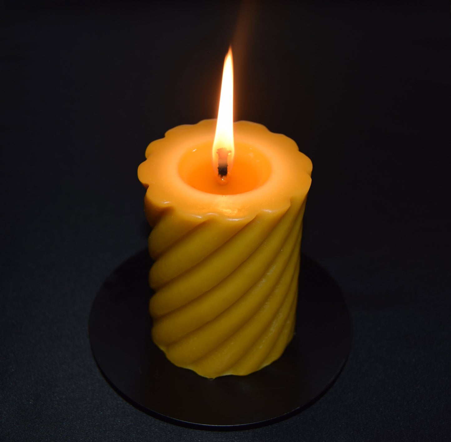 Burning Beeswax Pillar Candle