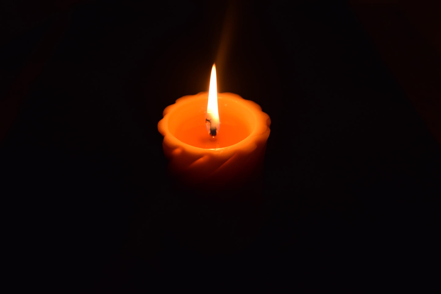 Burning Beeswax Pillar Candle