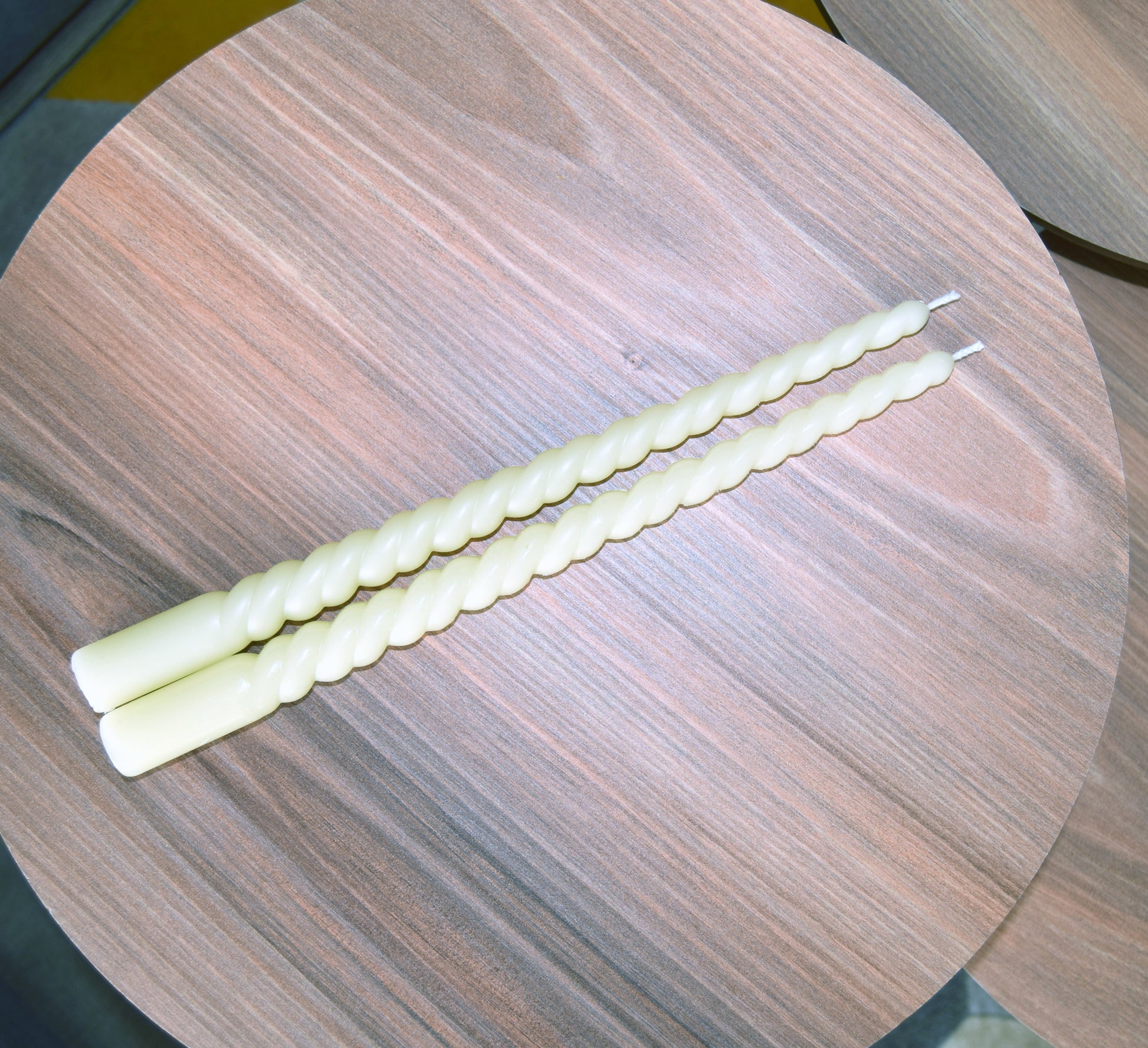 This is a picture of Homemade Dripless Beeswax Spiral Taper Candles