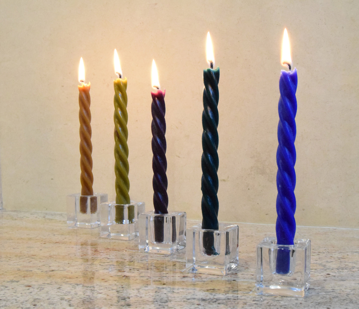 Spiral Beeswax Taper candles in differen colours and cube glass candle holders
